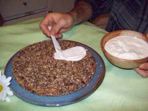 David frosts the cake