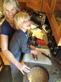 Grandma and Grandson cooking Thanksgiving Dinner